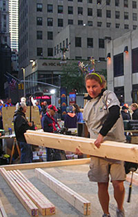 beam me up: Sarah Schindhelm, a volunteer coordinator for New Orleans Habitat for Humanity, helps residents rebuild in the wake of Hurricane Katrina.